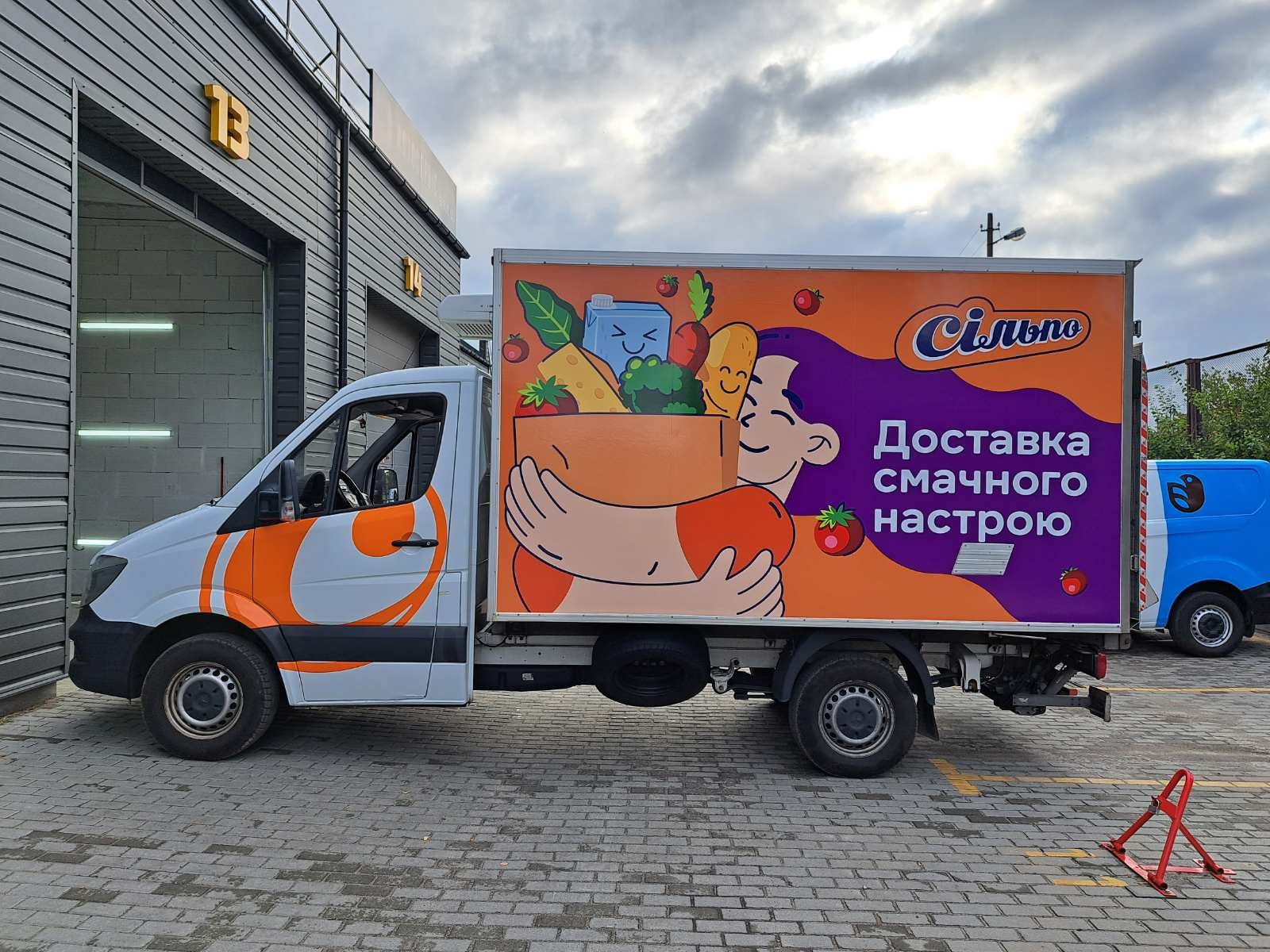 Vehicle wrap design for silpo delivery — project by WRAPKIT